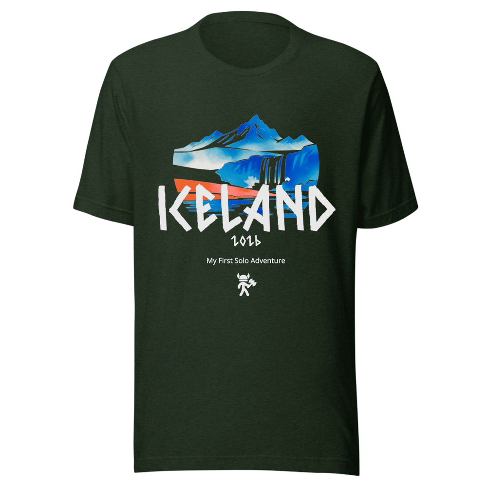 A dark forest green short-sleeve t-shirt with a graphic print on the front. The graphic features a stylized blue and white mountain landscape, the word 'ICELAND' in large white letters, '2036' below it, and 'My First Solo Adventure' with a small stick-figure illustration underneath.