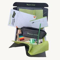 Vegout Voyage product packaging with stationery items on a white background