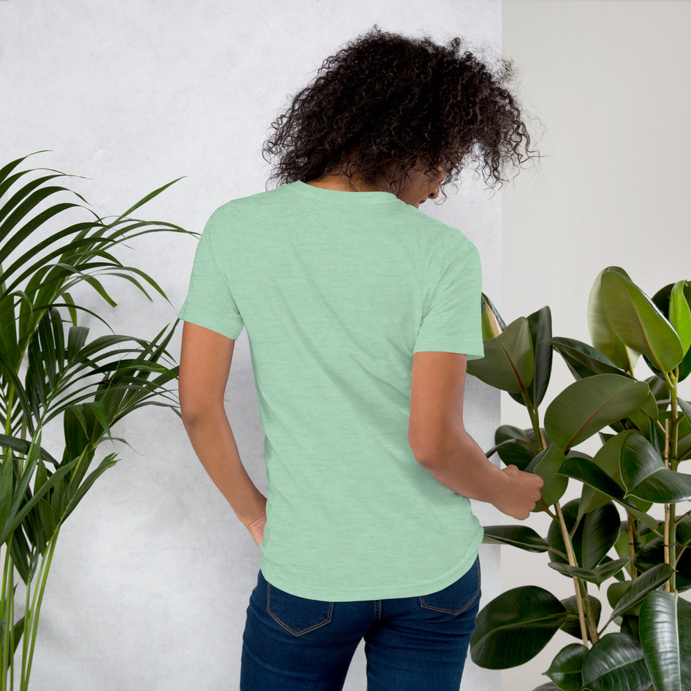 Back view of Heather Prism Mint emblem tee worn by woman